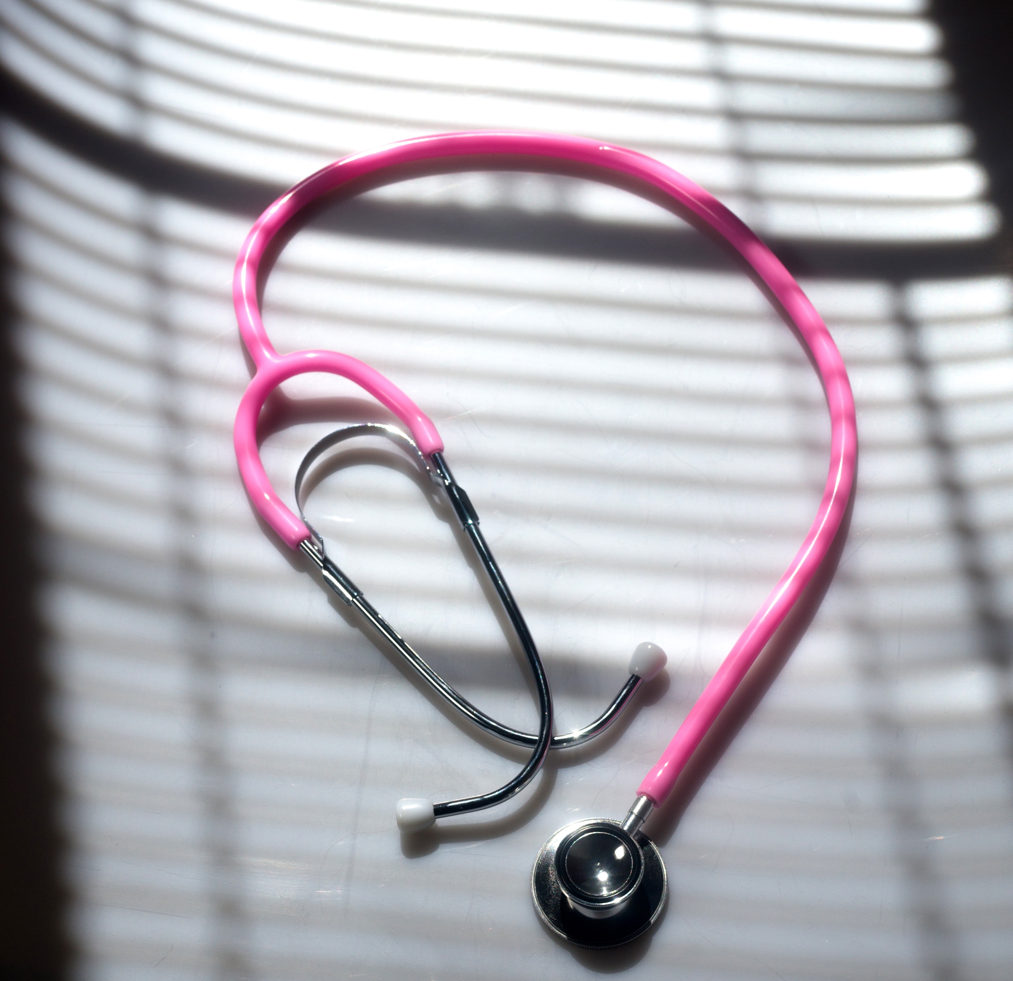 Pink stethoscope health doctor