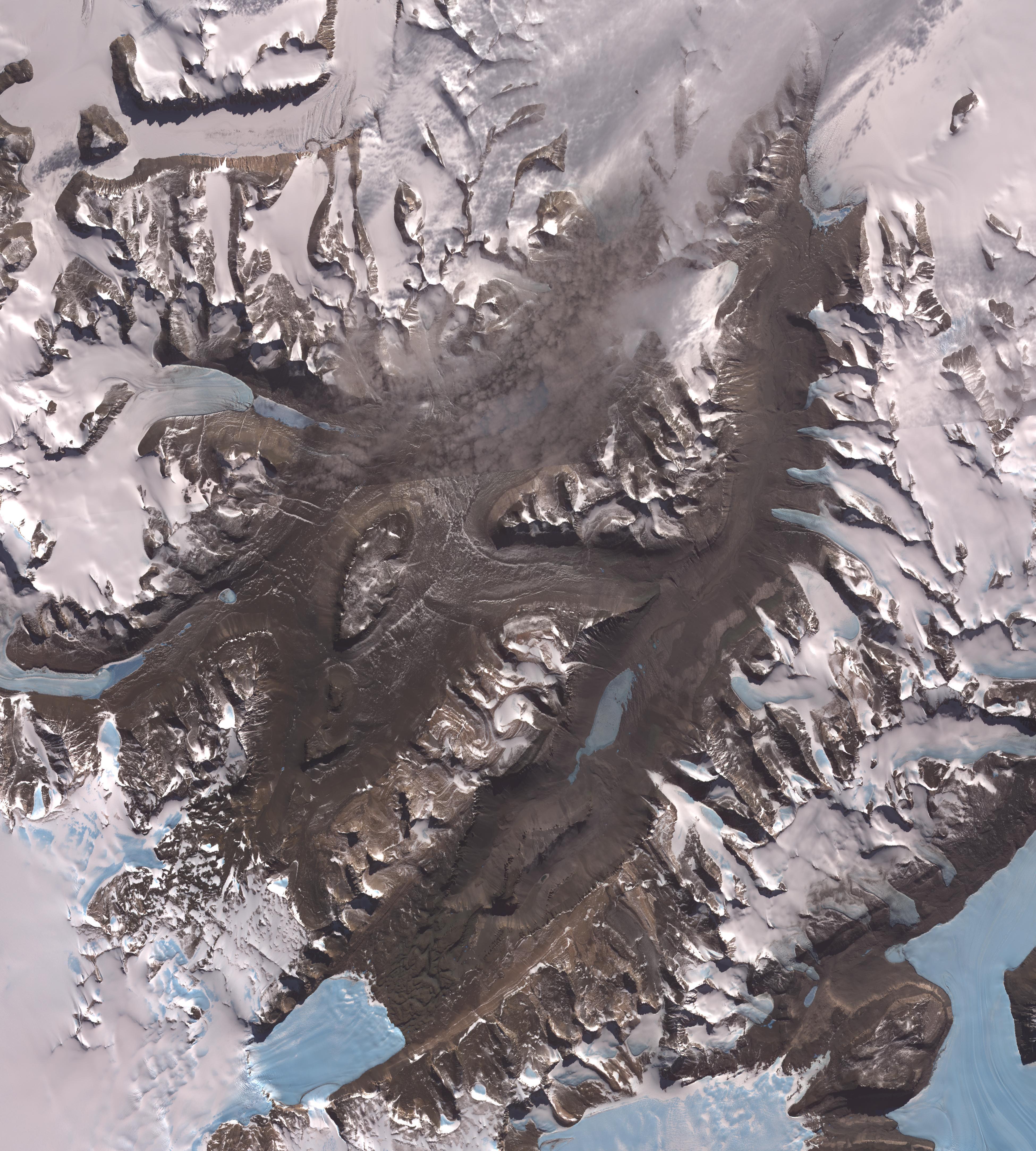 Satellite image of the McMurdo Dry Valleys, a row of valleys west of McMurdo Sound, Antarctica that are extremely dry with little snow or ice cover. Satellite image of the McMurdo Dry Valleys, a row of valleys west of McMurdo Sound, Antarctica that are extremely dry with little snow or ice cover.