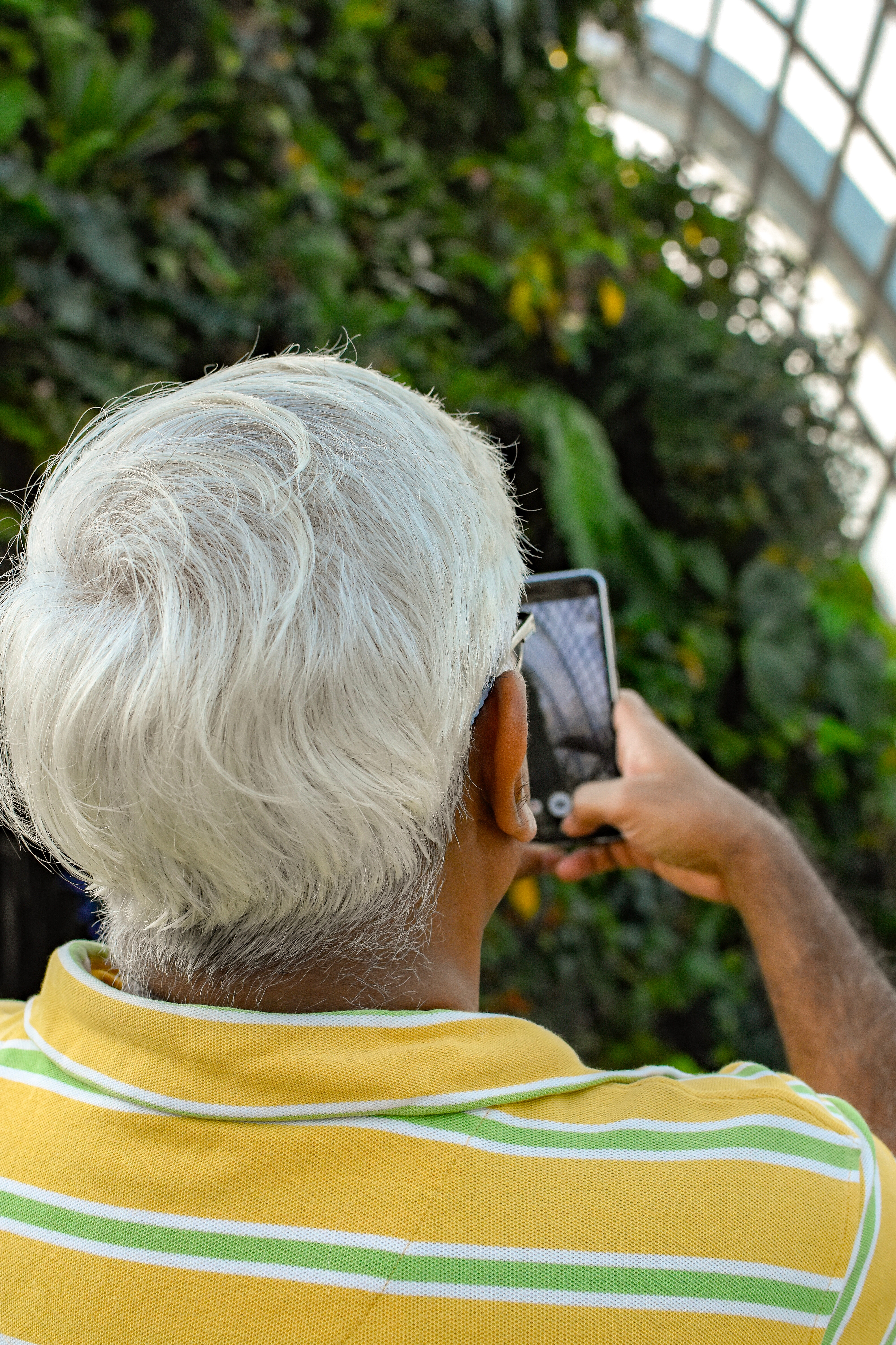 older man with cellphone